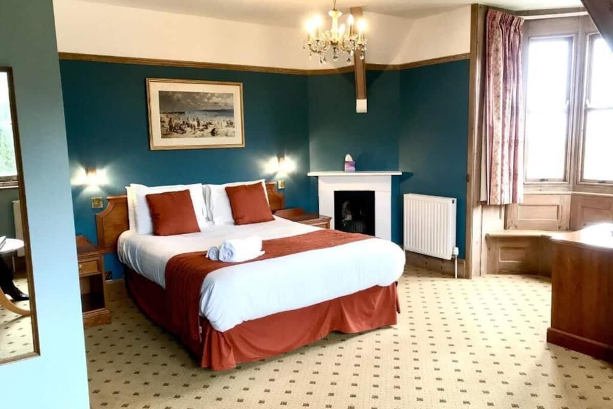 deluxe double room, 1 bedroom, ocean view | 1 bedroom, in-room safe, individually decorated, individually furnished