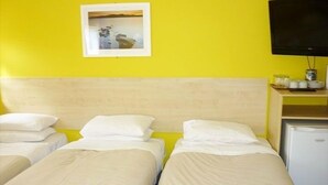 Triple Room, Shared Bathroom | Iron/ironing board (on request), bed sheets