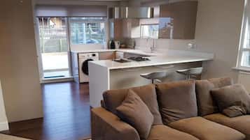 Panoramic Penthouse, 2 Bedrooms, Patio, Canal View | Individually decorated, individually furnished, desk, iron/ironing board