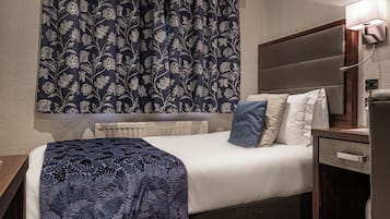 Habitación individual clásica | Cortinas blackout, tabla de planchar con plancha y wifi gratis