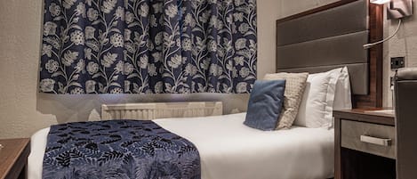 Classic Single Room | Blackout drapes, iron/ironing board, free WiFi, bed sheets