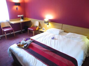 Premium bedding, desk, blackout curtains, soundproofing
