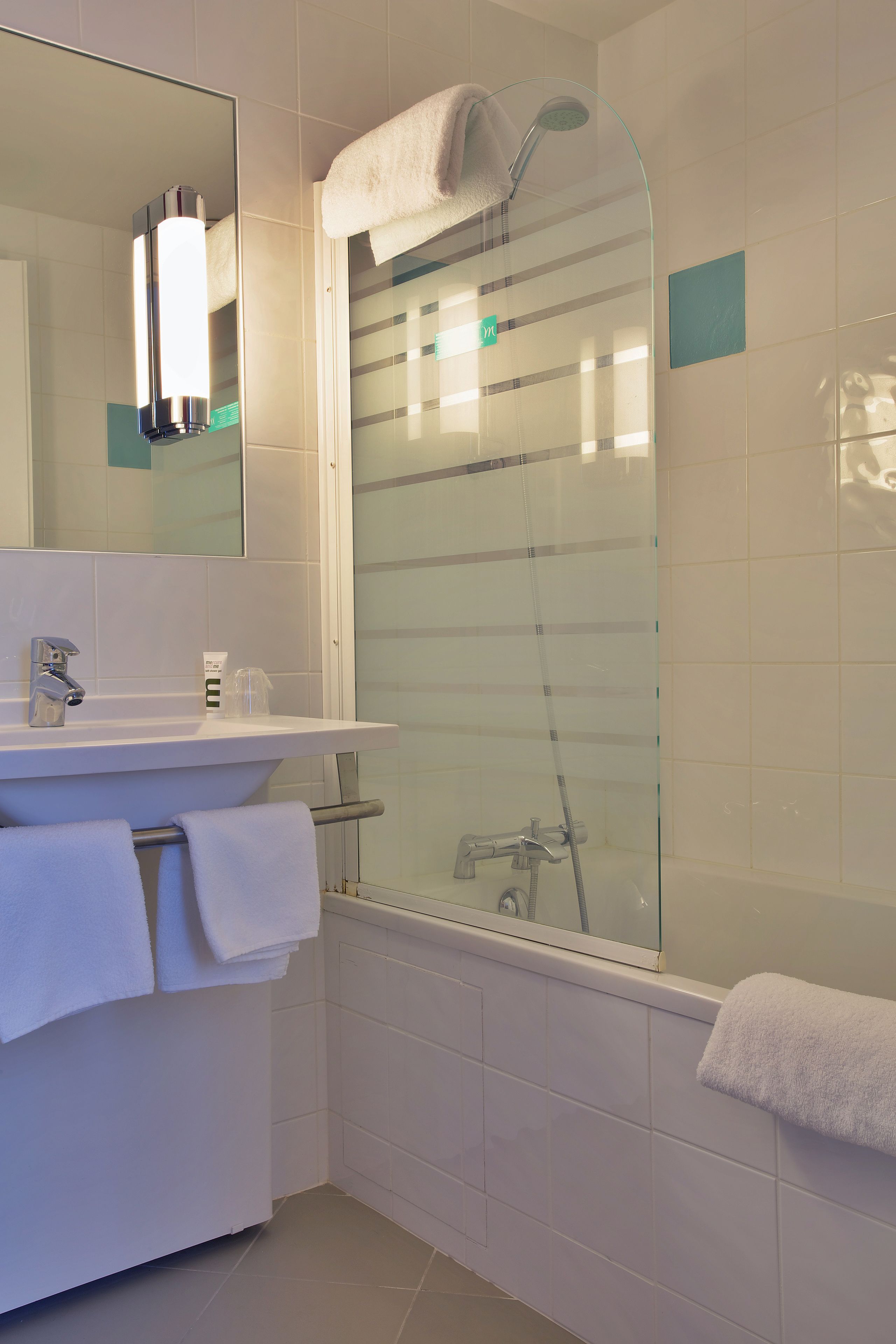 Eco-friendly toiletries, hair dryer, towels