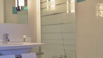 Eco-friendly toiletries, hair dryer, towels