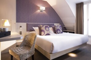 Deluxe Double Room | Minibar, in-room safe, individually decorated, individually furnished