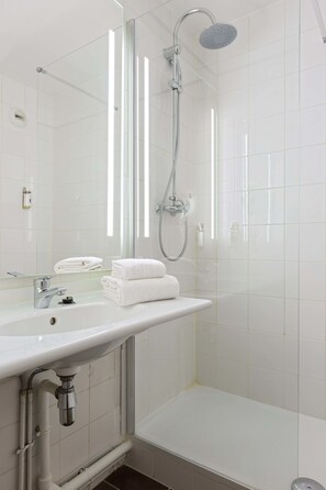 Shower, eco-friendly toiletries, hair dryer, towels