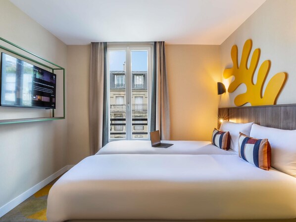Standard Room, 2 Twin Beds | Desk, soundproofing, iron/ironing board, free cribs/infant beds - ibis Styles Paris Jardin de la Villette (Paris)