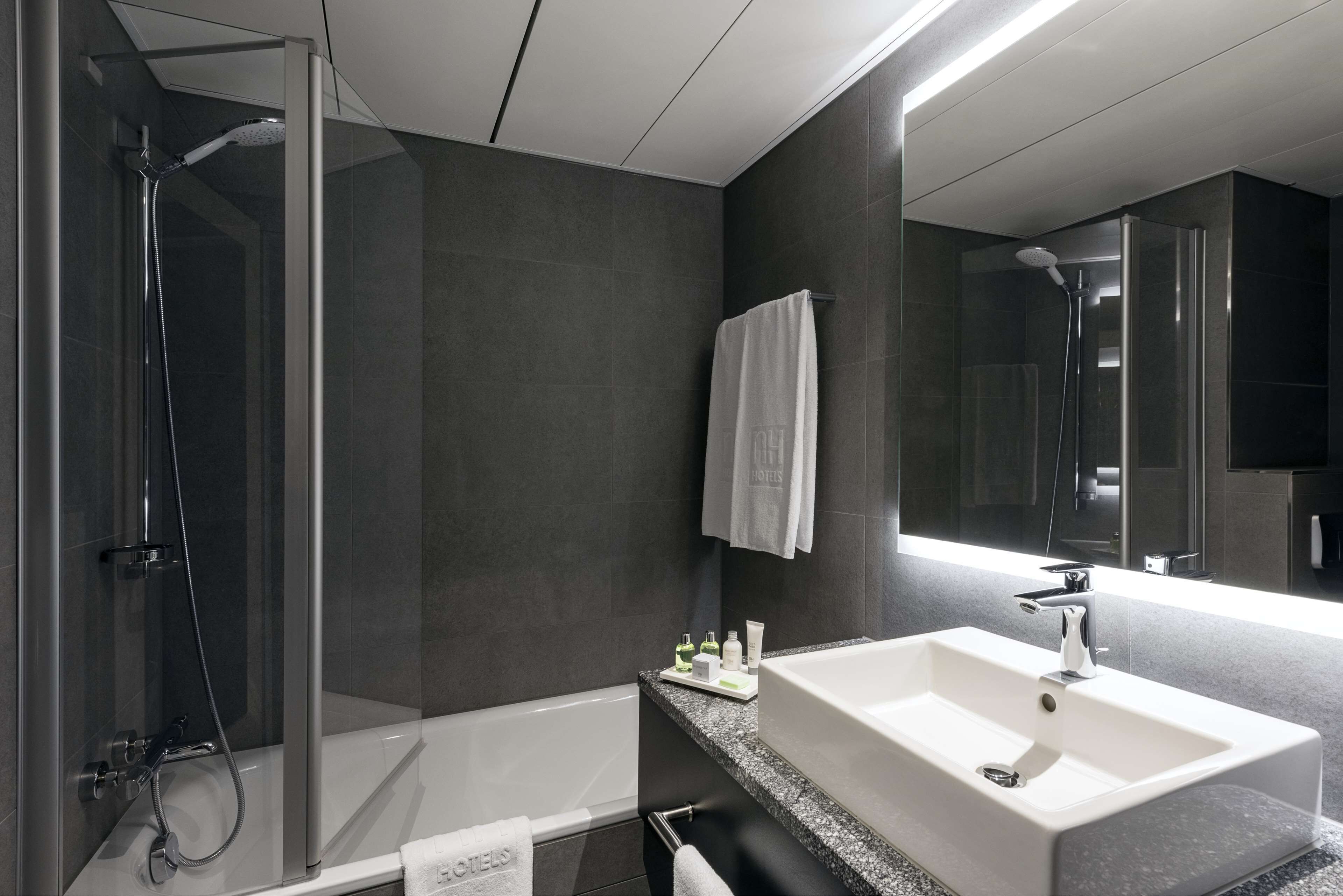 combined shower/bathtub, deep-soaking bathtub, eco-friendly toiletries