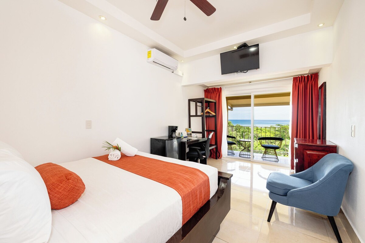 Standard Double Room (Sea View) | In-room safe, desk, laptop workspace, blackout drapes