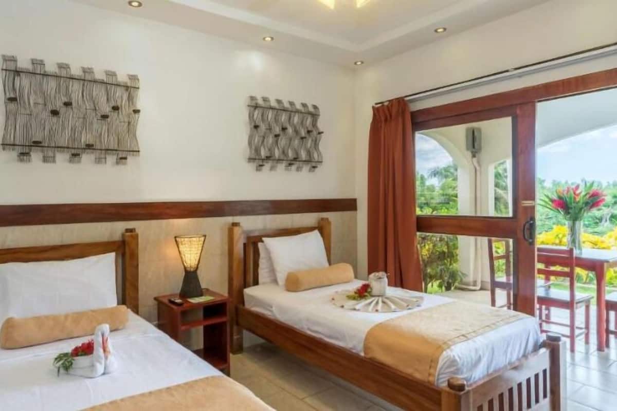 Familien-Doppel- oder -Zweibettzimmer | 1 Schlafzimmer, hochwertige Bettwaren, Zimmersafe, individuell dekoriert