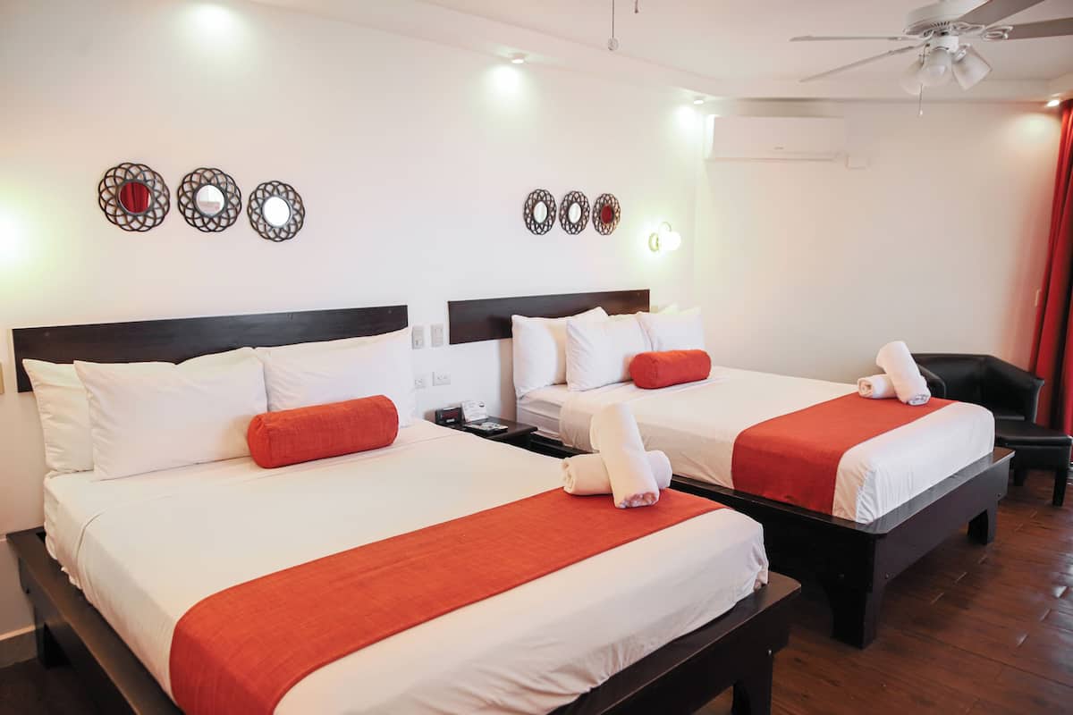 Premium bedding, in-room safe, individually decorated