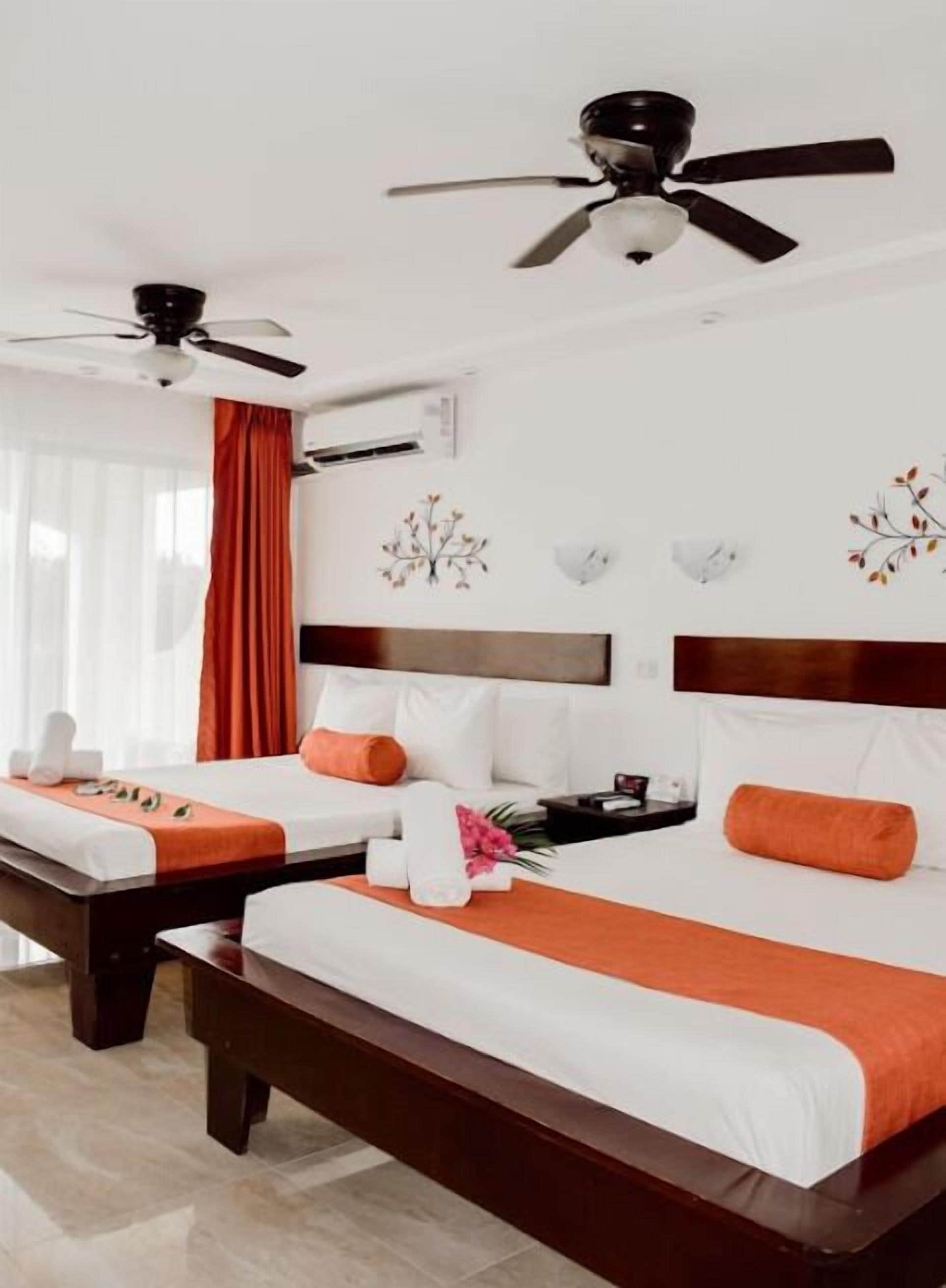 Superior Quadruple Room (Balcony or Patio) | Premium bedding, in-room safe, individually decorated