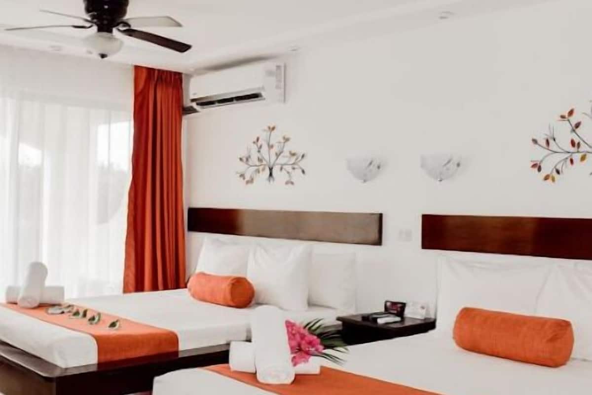 Superior-Vierbettzimmer | 1 Schlafzimmer, hochwertige Bettwaren, Zimmersafe, individuell dekoriert