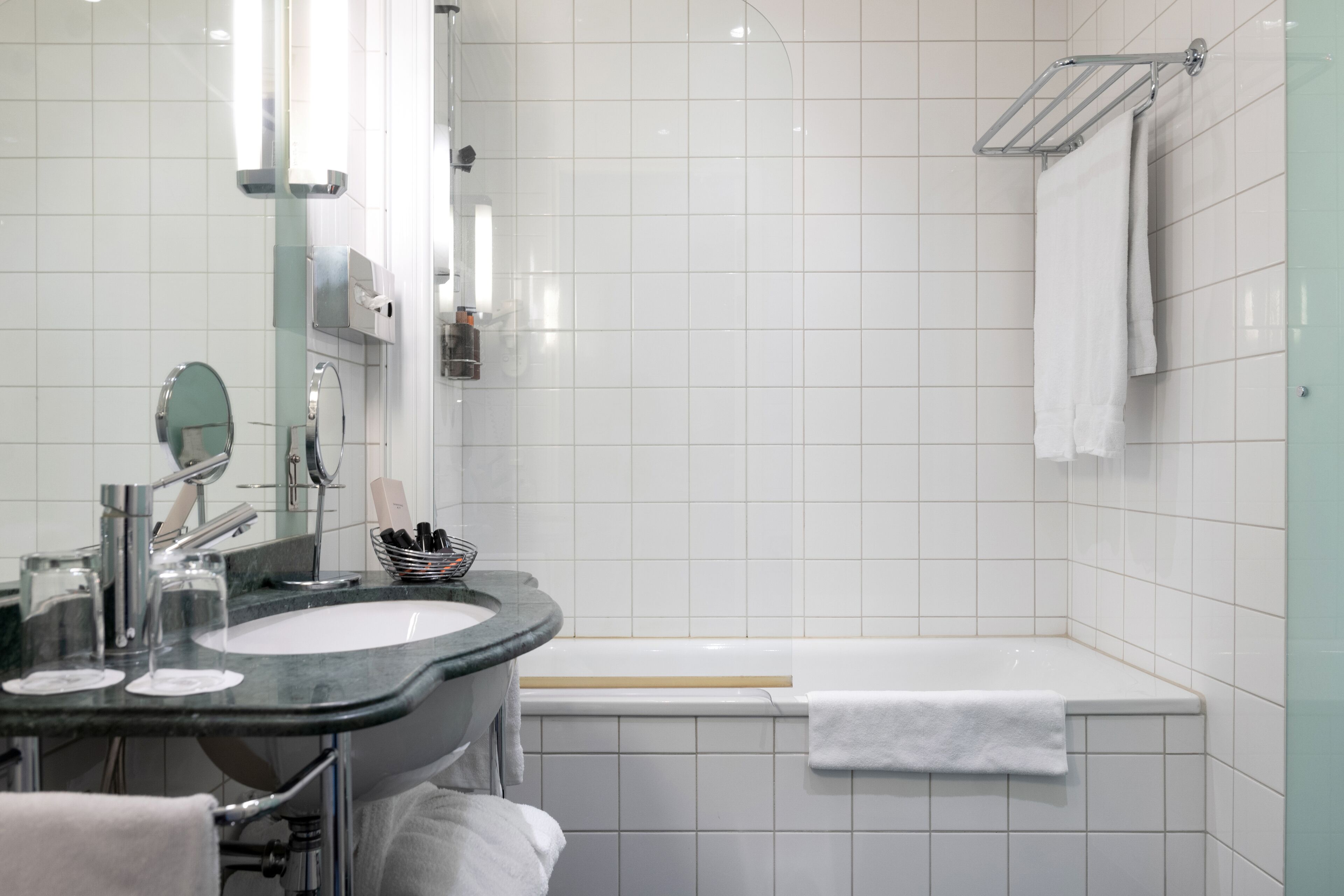 free toiletries, hair dryer, heated floors, towels