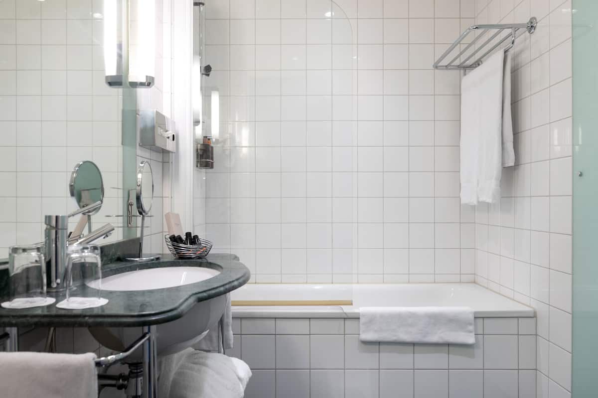 free toiletries, hair dryer, heated floors, towels