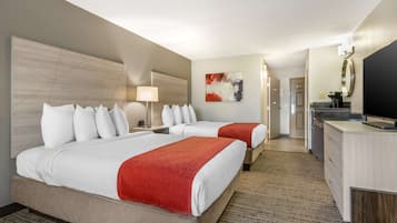 Premium bedding, pillow-top beds, desk, laptop workspace