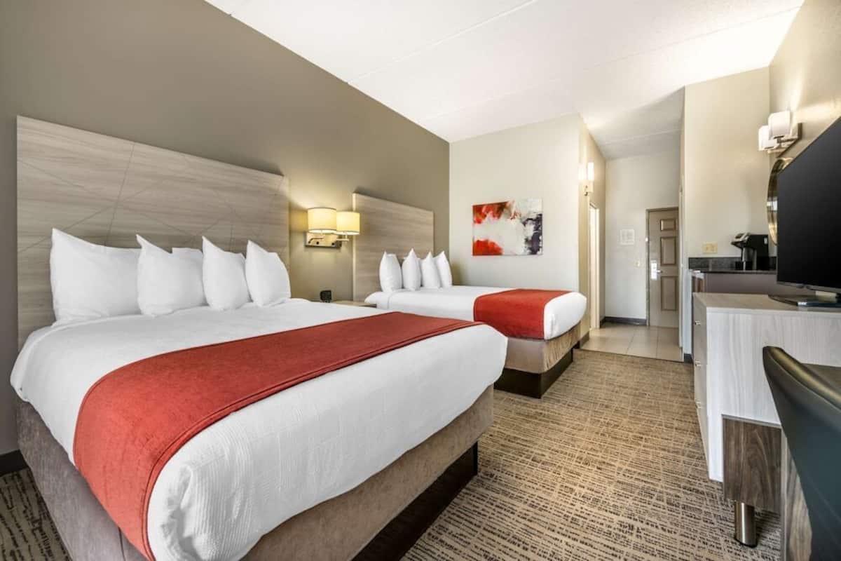 Premium bedding, pillowtop beds, desk, laptop workspace