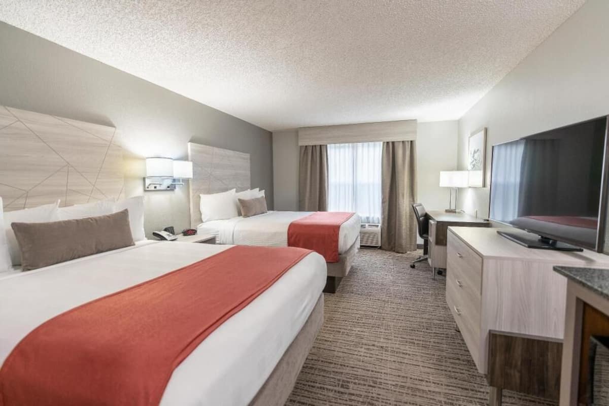 Premium bedding, pillowtop beds, desk, laptop workspace