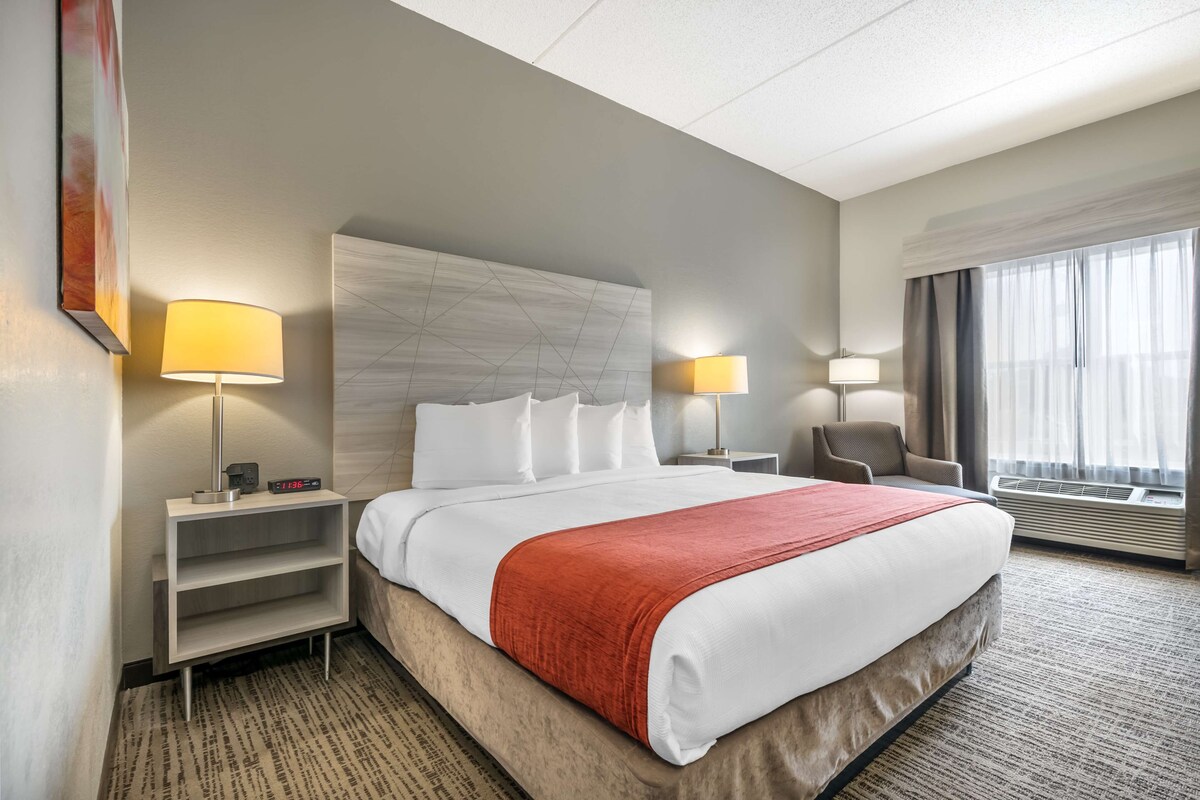 Premium bedding, pillow-top beds, desk, laptop workspace