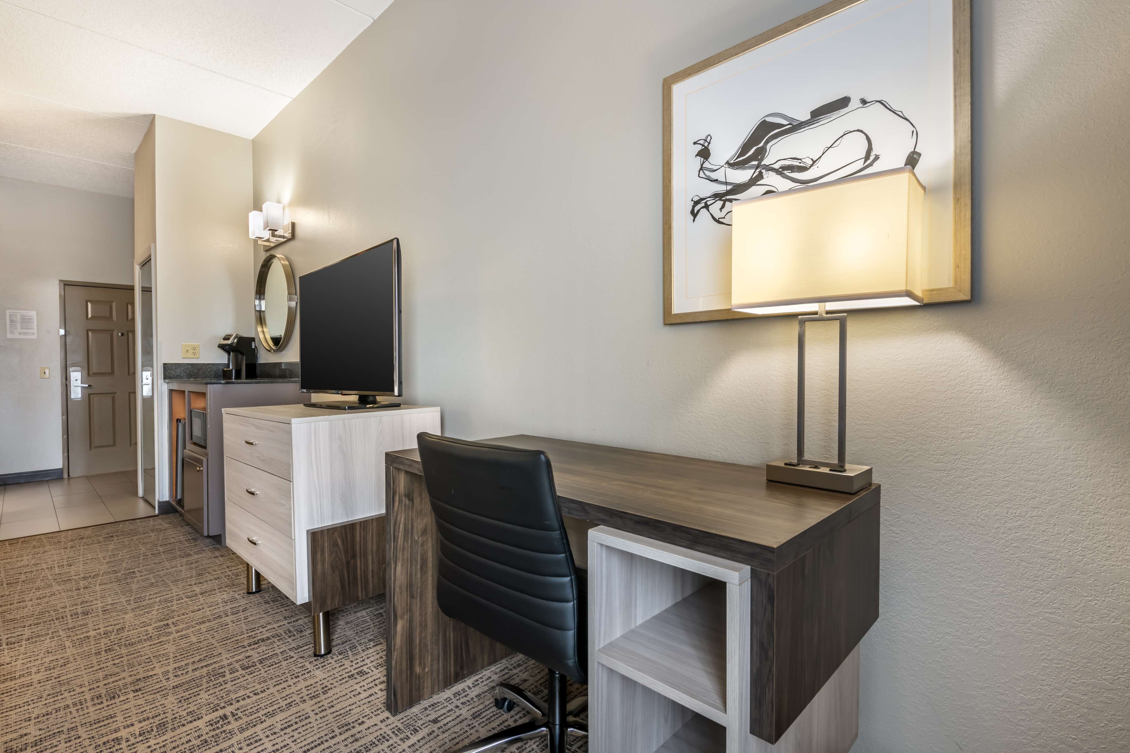 premium bedding, pillow-top beds, desk, laptop workspace