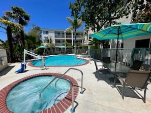 Outdoor pool, open 7:00 AM to 10:00 PM, pool umbrellas, pool loungers