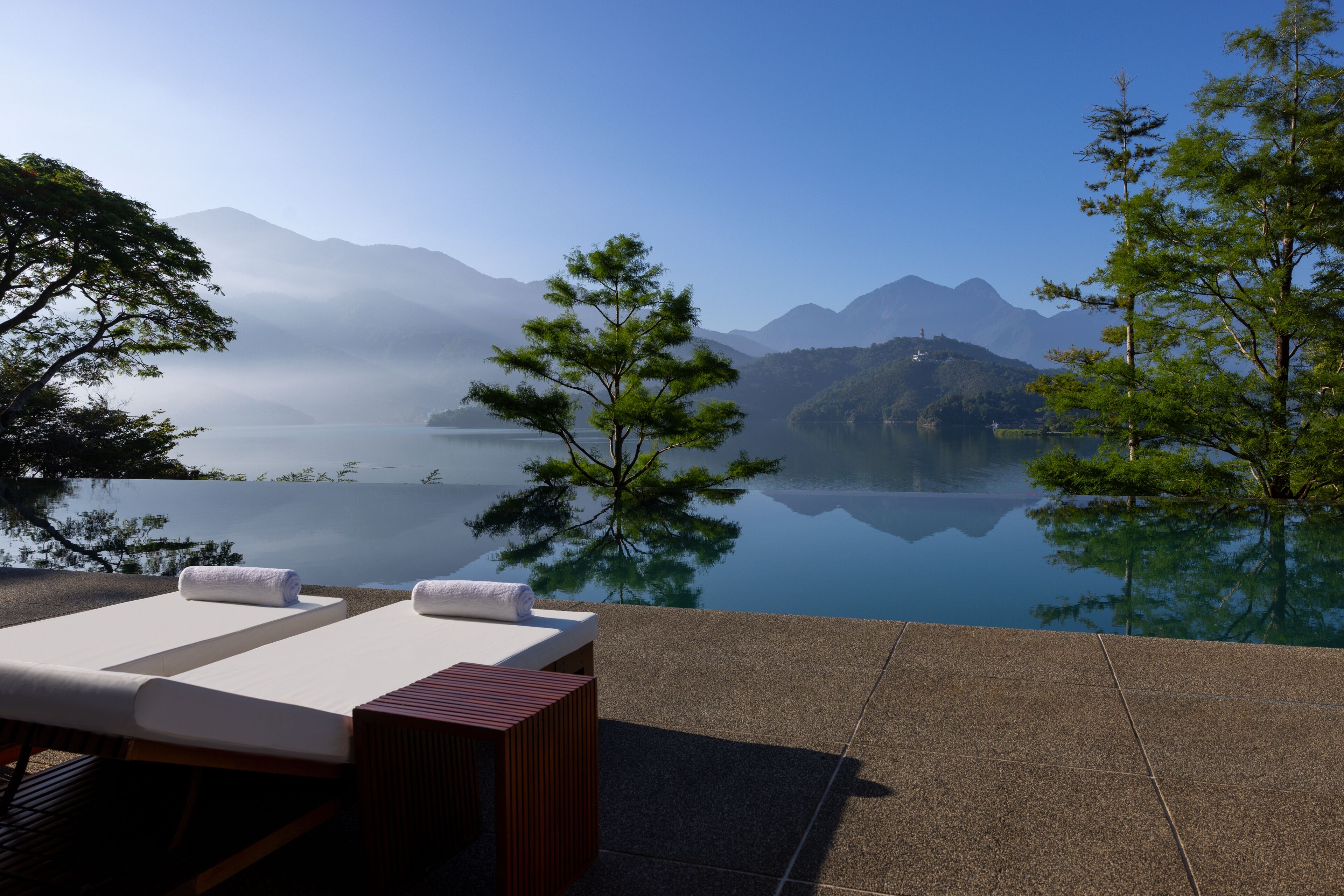 Outdoor pool, open 7:00 AM to 7:00 PM, pool umbrellas, sun loungers
