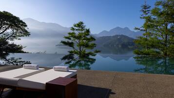Outdoor pool, open 7:00 AM to 7:00 PM, pool umbrellas, sun loungers