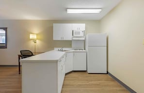 Fridge, microwave, stovetop, coffee/tea maker