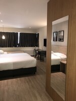 Family Room, 2 Twin Beds, Non Smoking | Down comforters, in-room safe, desk, laptop workspace