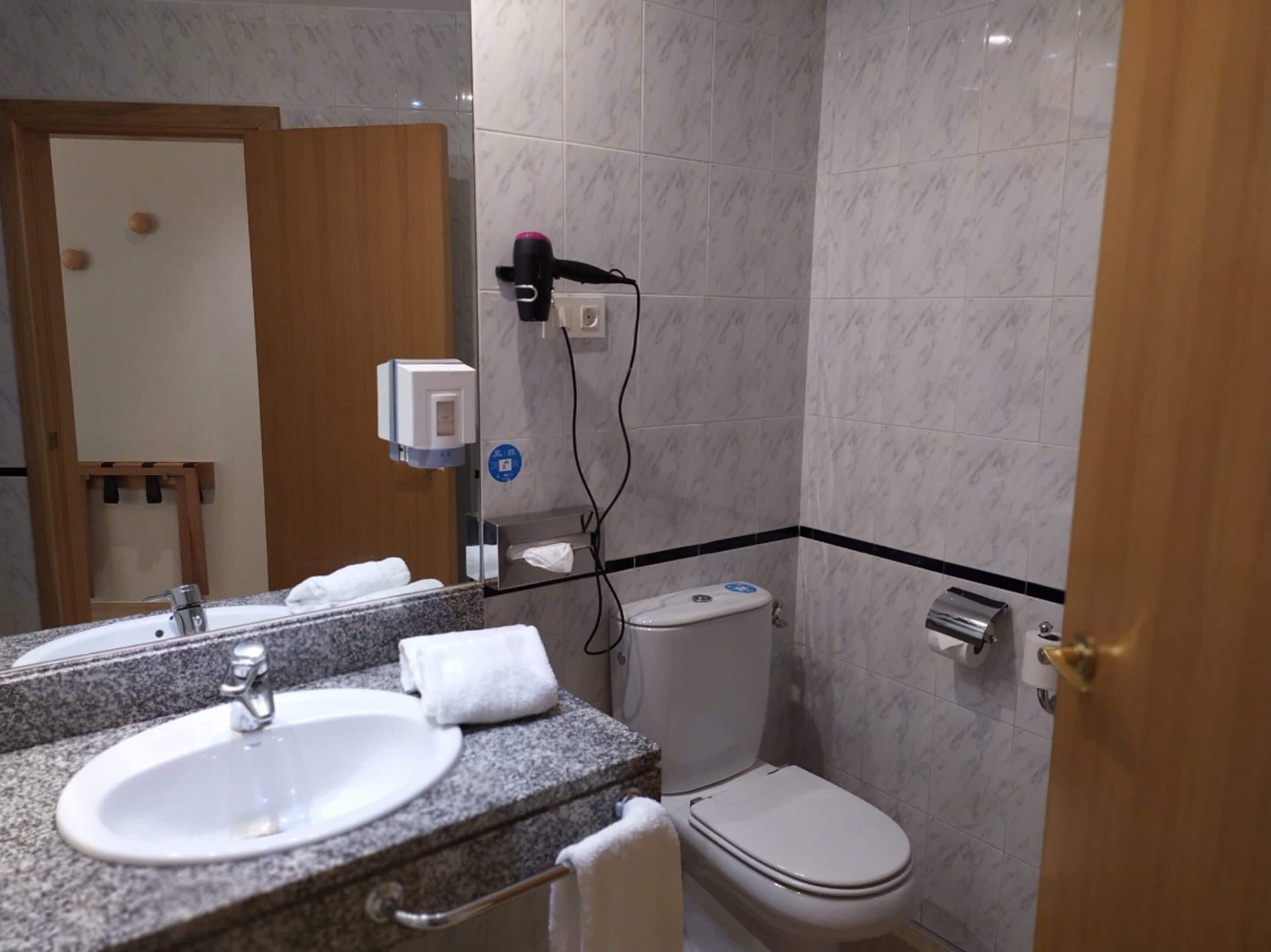 deep-soaking bathtub, free toiletries, hair dryer, towels