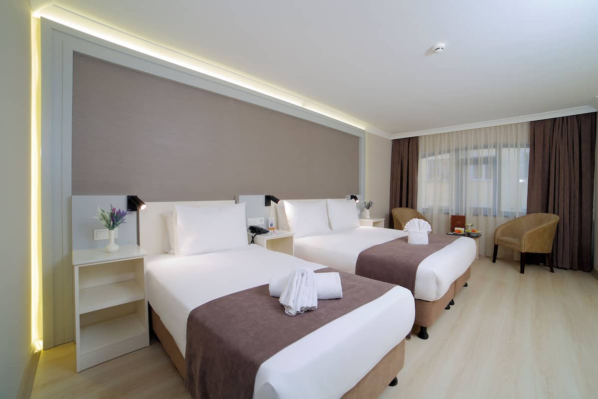 Deluxe-Dreibettzimmer