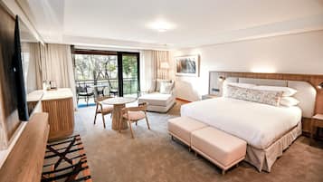 Habitación Deluxe | Ropa de cama de alta calidad y minibar