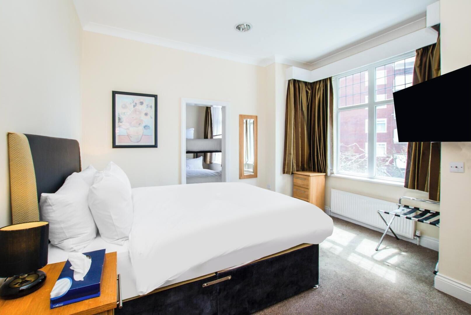 Pillow-top beds, desk, free WiFi, bed sheets