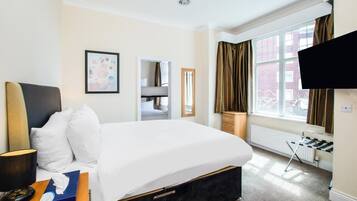 Pillow-top beds, desk, free WiFi, bed sheets