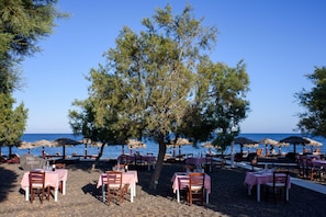 Breakfast, lunch, dinner served; Greek cuisine, beach views