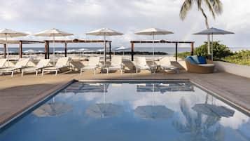 Outdoor pool, pool umbrellas, sun loungers