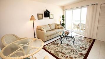 Suite, 2 Bedrooms | Living room | 40-inch LCD TV with cable channels, TV