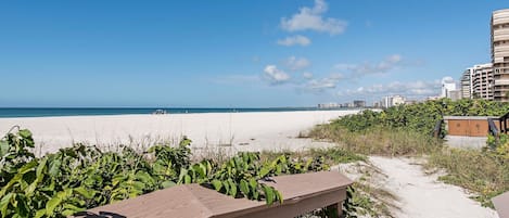 Beach nearby, white sand, beach towels