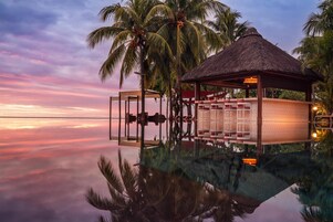 3 bars/lounges, 2 poolside bars, beach bar