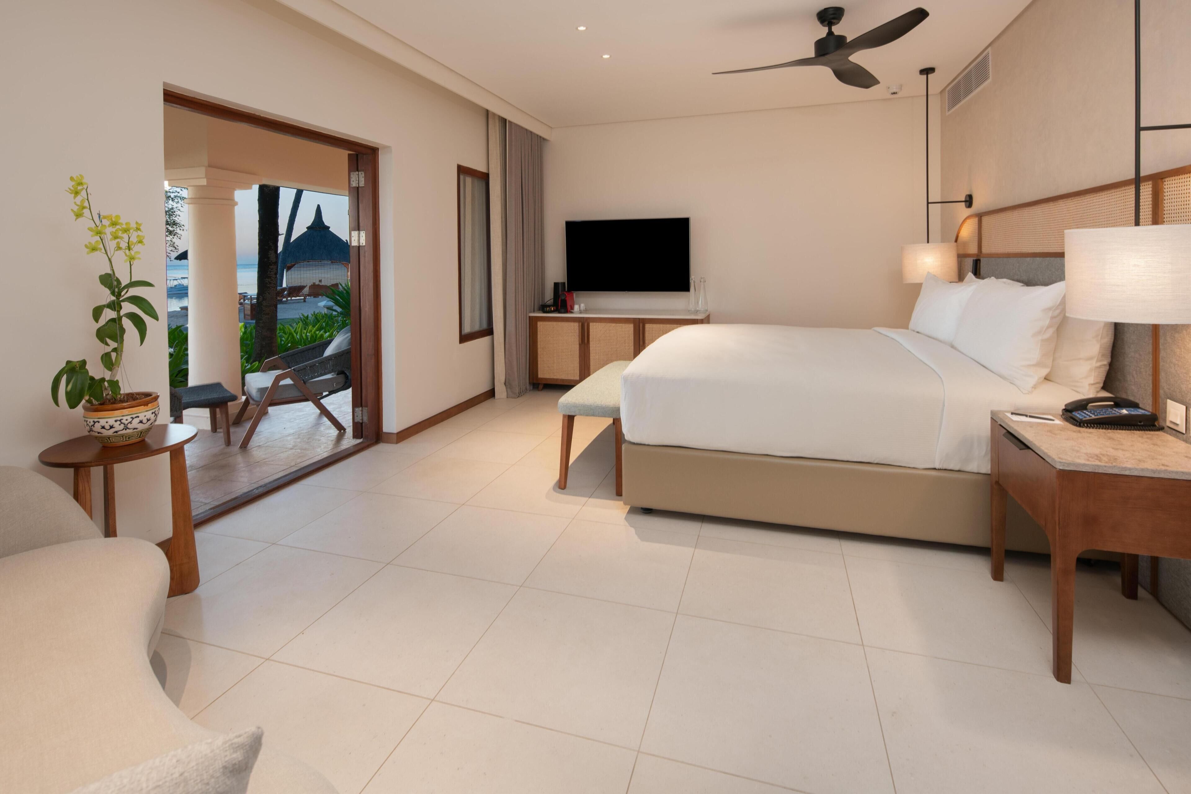 Chambre, 1 très grand lit, en front de plage