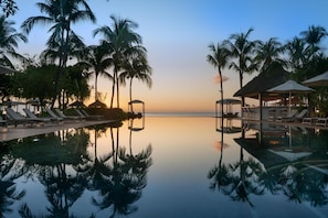 2 outdoor pools, pool umbrellas, sun loungers