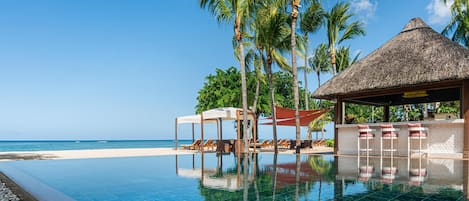 2 outdoor pools, pool umbrellas, sun loungers