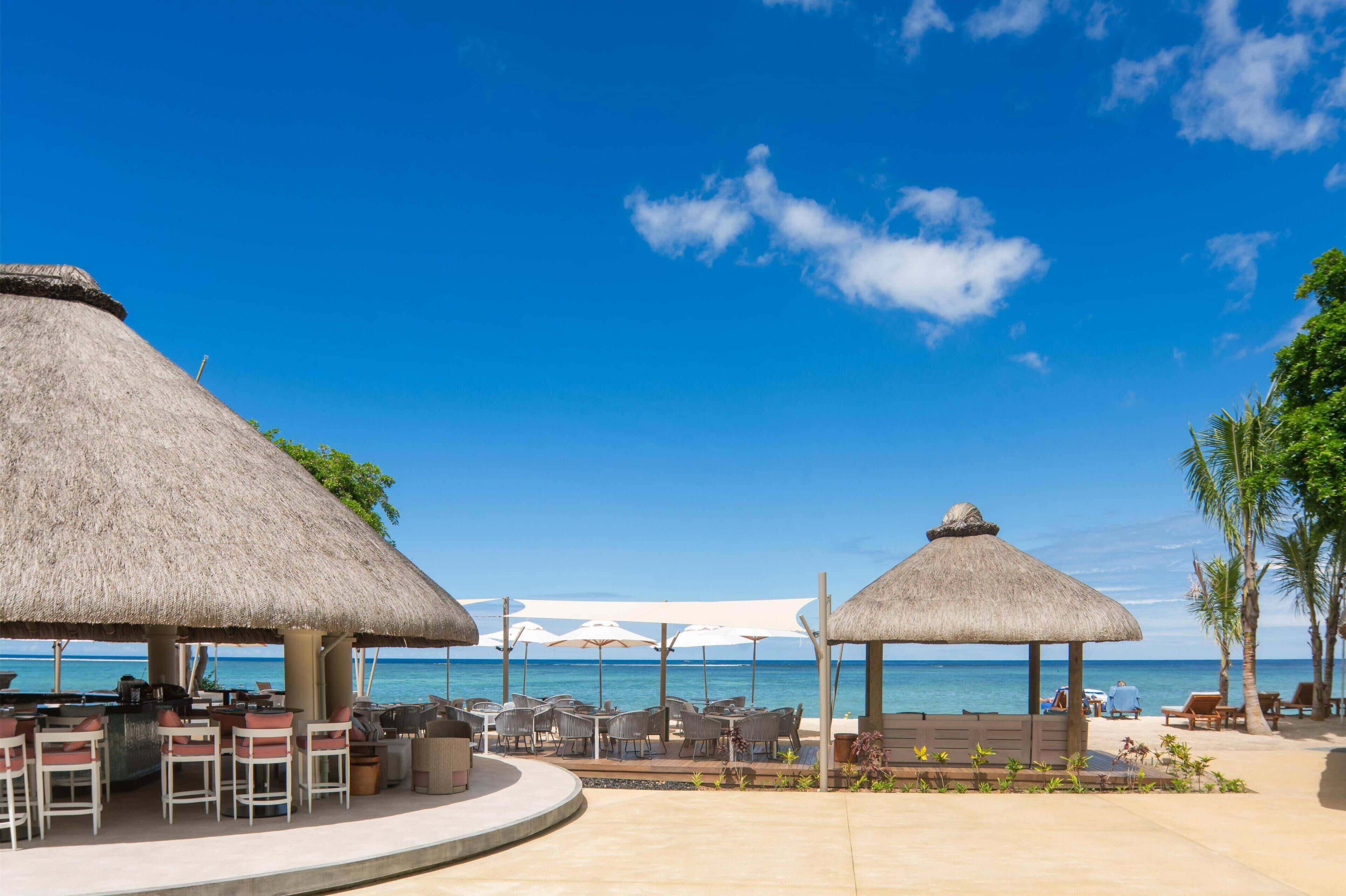3 bars/lounges, 2 poolside bars, beach bar