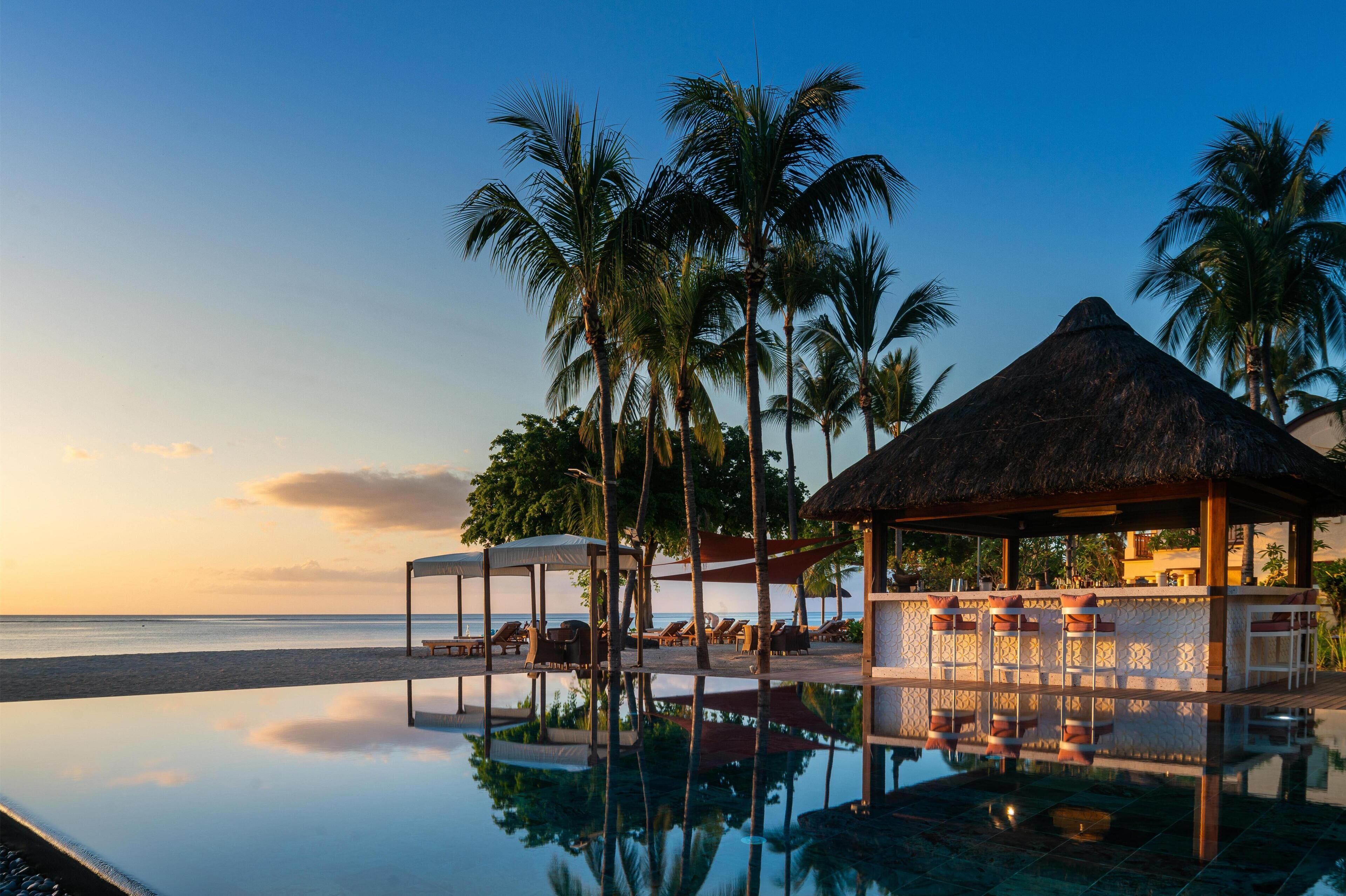 2 outdoor pools, pool umbrellas, pool loungers