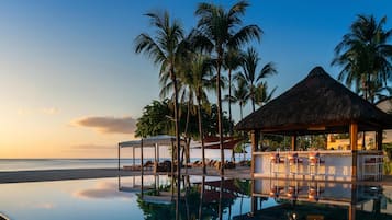 2 outdoor pools, pool umbrellas, pool loungers