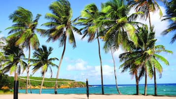 On the beach, sun loungers, beach towels