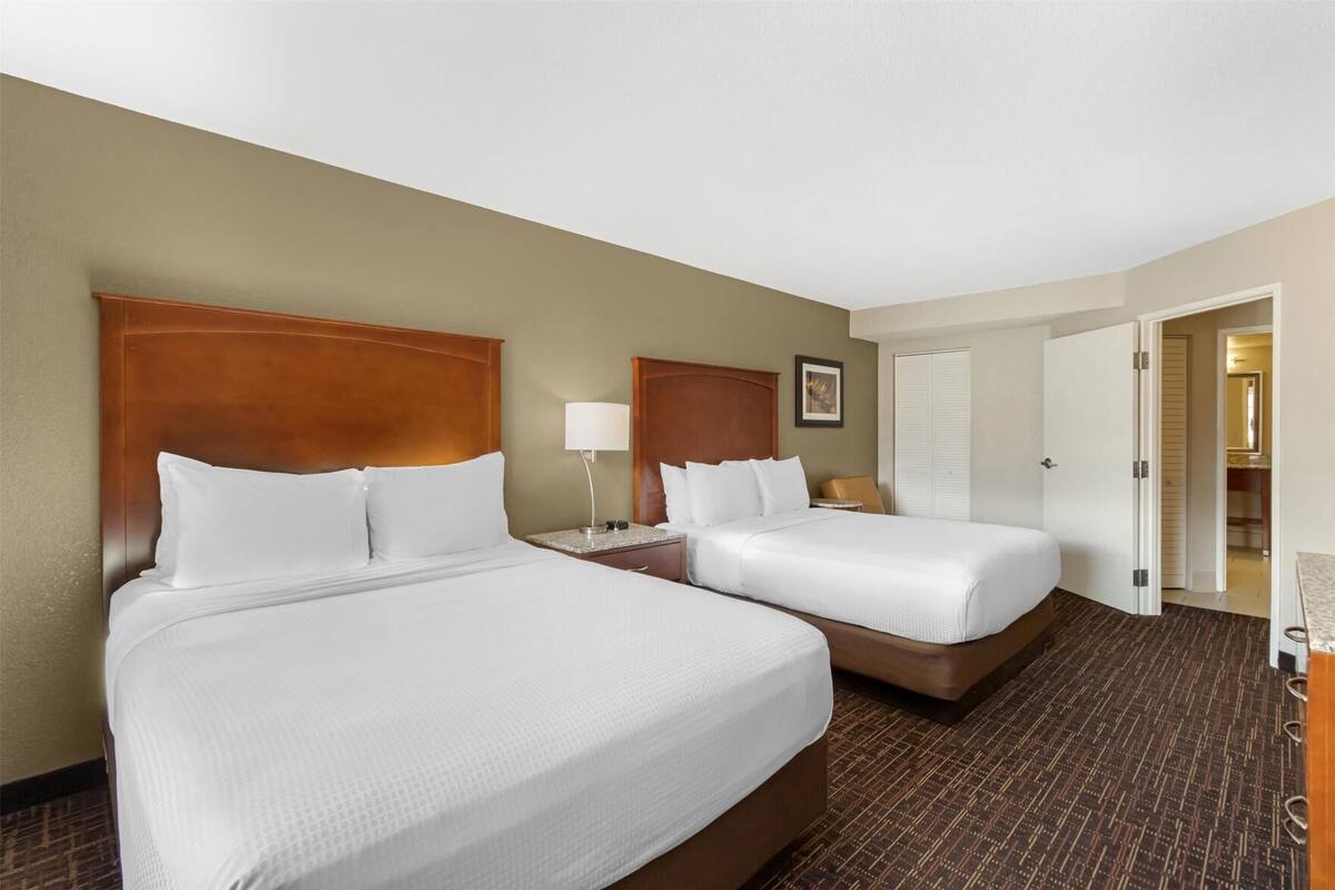 Premium bedding, pillow-top beds, in-room safe, desk