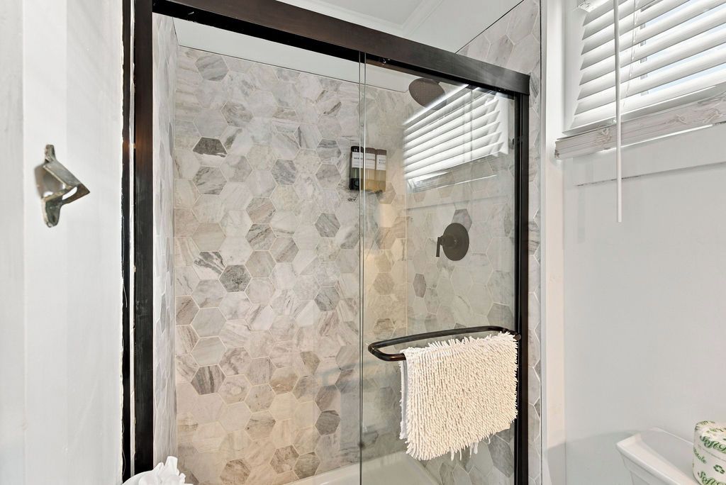 Newly Renovated Tropical King 2nd floor | Bathroom | Shower, rainfall showerhead, designer toiletries, hair dryer