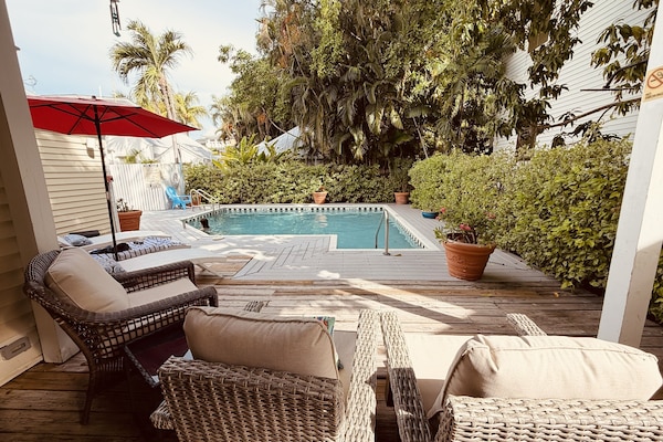 Outdoor pool, open 8:00 AM to 8:00 PM, pool umbrellas, sun loungers