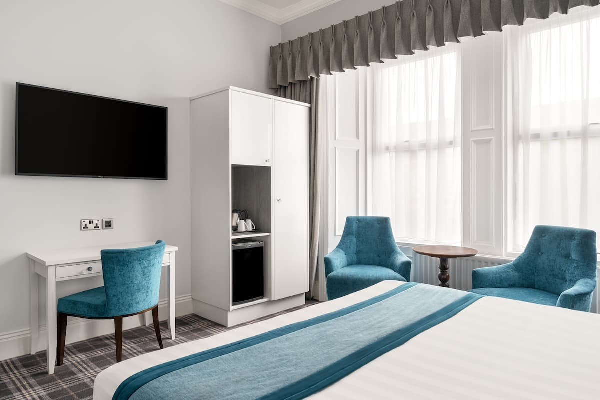 carlton classic double room (separate building) | desk, laptop workspace, iron/ironing board, free wifi